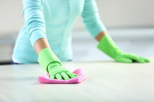 Office cleaners disinfecting kitchen and washroom areas in Richmond
